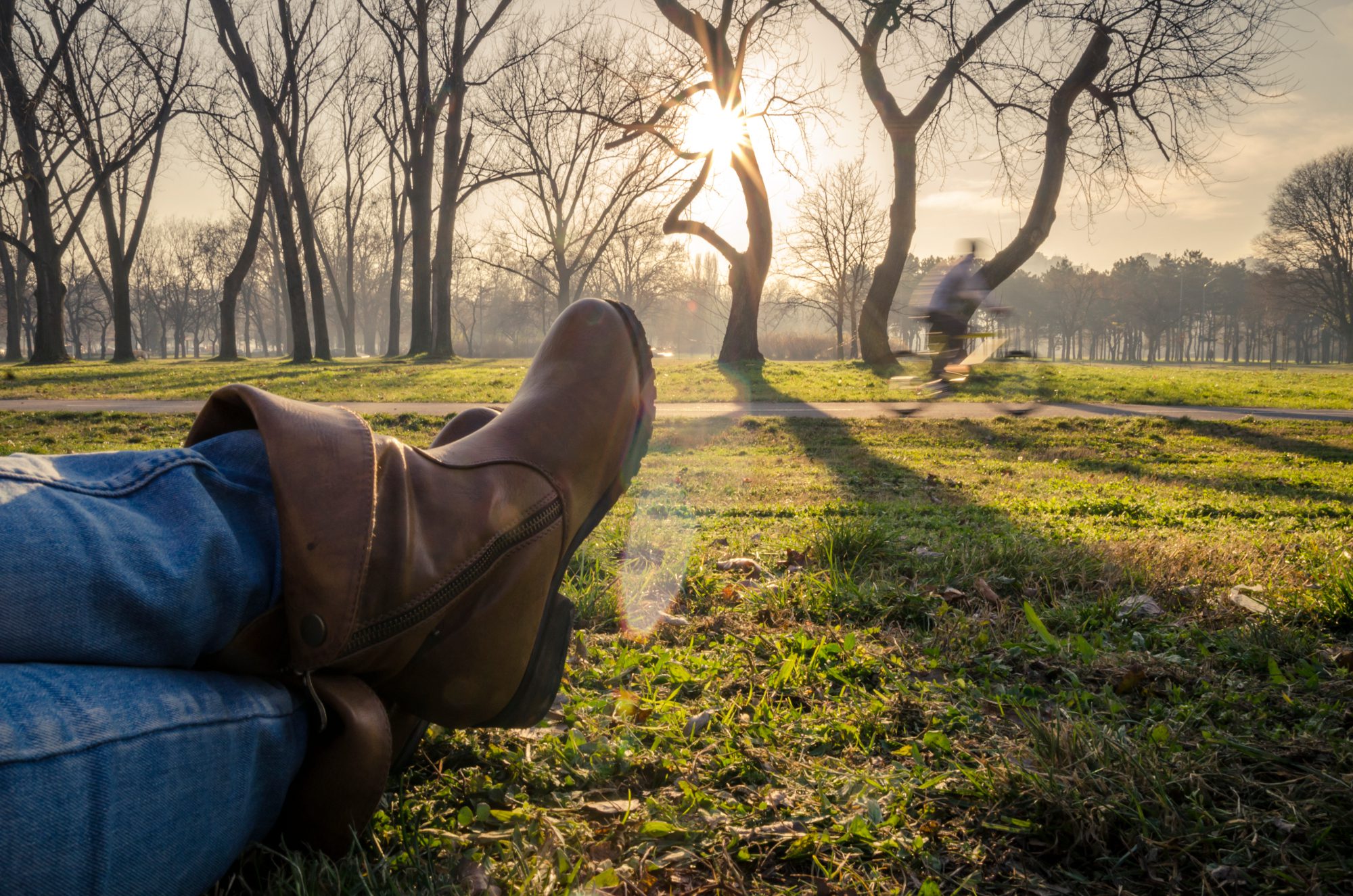 Woman in boots resting in nature